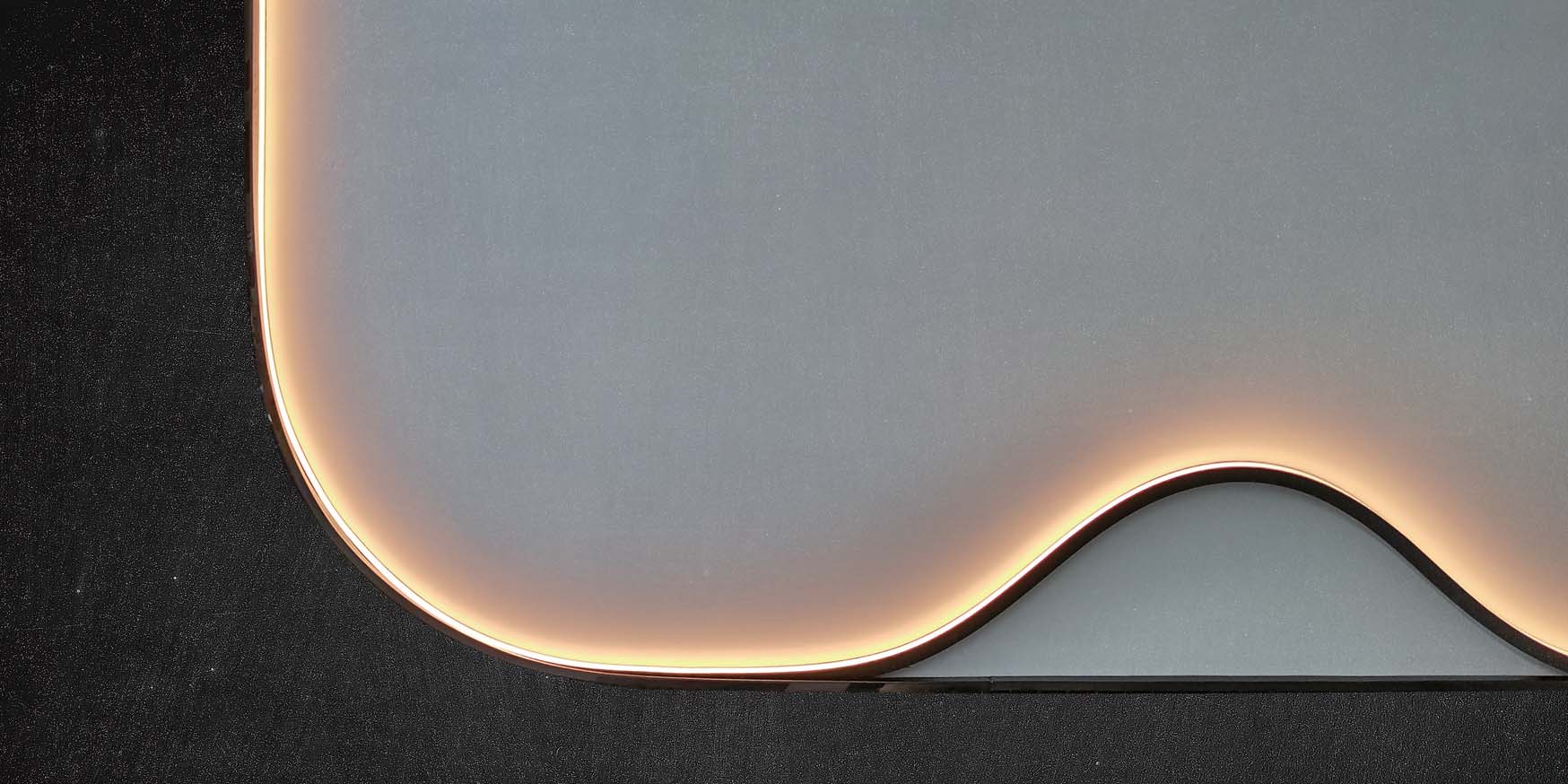 Warm white light line with a black silicone finish